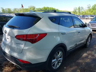 2013 Hyundai Santa Fe Sport z VIN 5XYZU3LA2DG122845, wystawiony jako IAAI lot #39368336 z przebiegiem 101 257 mil mil oraz . Historia ofert i sprzedaży dostępna na DreamBid. Obrazek 4.
