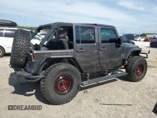 2016 Jeep Wrangler Unlimited Rubicon with VIN 1C4BJWFG8GL192077, listed as a Copart auction lot 58339005 with 62,076 mi miles and Salvage title. Bid and sale history available at DreamBid. Image 3.