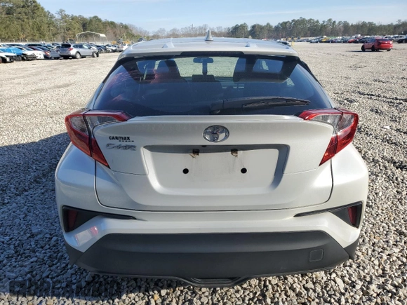 2021 Toyota C-HR LE with VIN NMTKHMBX8MR121525, listed as a Copart auction lot 47858985 with 87,809 mi miles and Salvage Title. Bid and sale history available at carsss.com. Image 6.