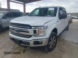 2019 Ford F-150 XL with VIN 1FTEW1E50KFA47687, listed as a IAAI auction lot 42021043 with 129,337 mi miles. Bid and sale history available at carsss.com. Image 20.