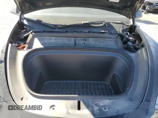 2023 Tesla Model Y Performance with VIN 7SAYGDEF7PF924355, listed as a Copart auction lot 47877055 with 64,663 mi miles and Salvage Title. Bid and sale history available at DreamBid. Image 14.