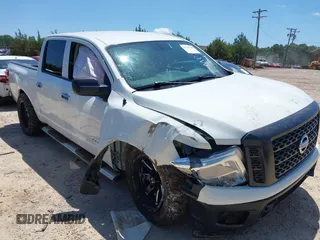 2017 Nissan Titan SV with VIN 1N6AA1EK4HN505570, listed as a IAAI auction lot 42535740 with 148,336 mi miles and . Bid and sale history available at DreamBid. Image 1.