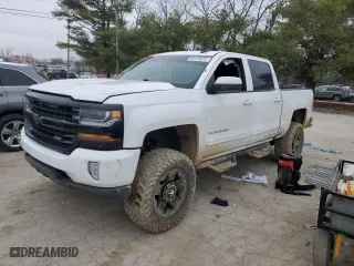 2016 Chevrolet Silverado 1500 LT with VIN 3GCUKREC9GG132988, listed as a Copart auction lot 44128575 with 124,764 mi miles and Salvage Title. Bid and sale history available at carsss.com. Image 1.