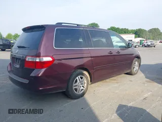 2007 Honda Odyssey EX-L with VIN 5FNRL387X7B140635, listed as a IAAI auction lot 42036807 with 292,774 mi miles. Bid and sale history available at carsss.com. Image 4.