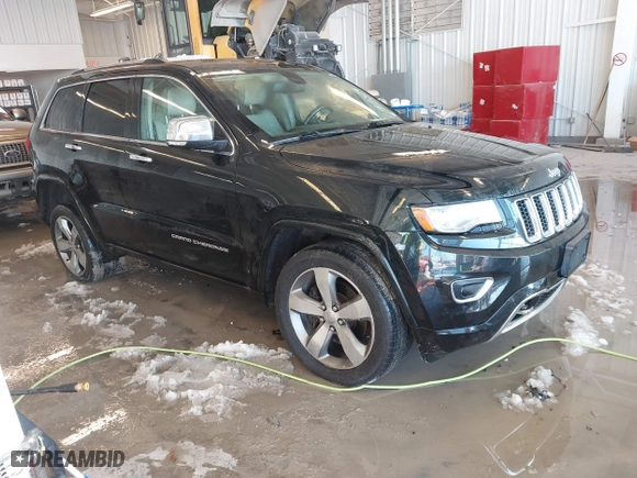 2014 Jeep Grand Cherokee Overland with VIN 1C4RJFCT7EC187319, listed as a IAAI auction lot 41256107 with 98,287 mi miles. Bid and sale history available at carsss.com. Image 1.
