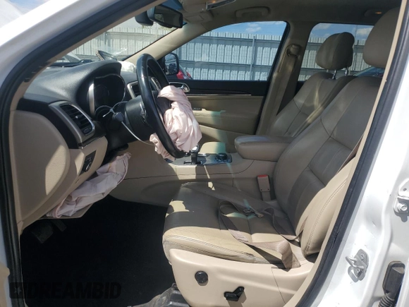 2014 Jeep Grand Cherokee Limited z VIN 1C4RJFBG5EC545425, wystawiony jako Copart lot #54035445 z przebiegiem 135 309 mil mil oraz Szkoda całkowita • Salvage title. Historia ofert i sprzedaży dostępna na DreamBid. Obrazek 7.