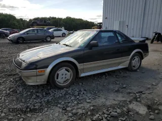1986 Toyota MR2 z VIN JT2AW15C6G0075929, wystawiony jako Copart lot #68167924 z przebiegiem 123 975 mil mil oraz Tytuł czysty. Historia ofert i sprzedaży dostępna na DreamBid. Obrazek 1.