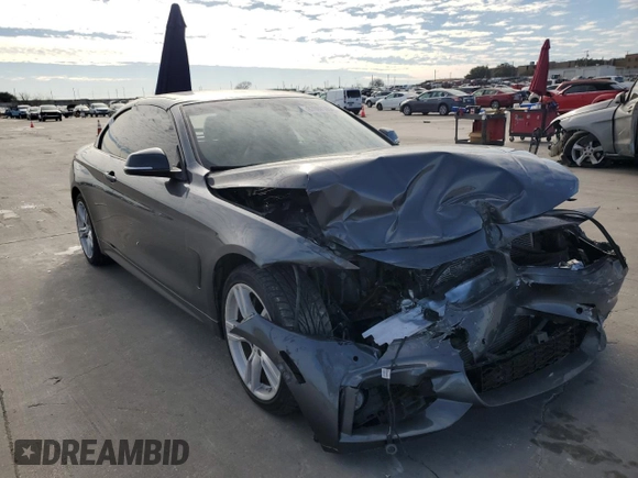 2015 BMW 4 Series 435i xDrive with VIN WBA3T7C53F5A37043, listed as a Copart auction lot 87697145 with 98,031 mi miles and Salvage title. Bid and sale history available at DreamBid. Image 4.