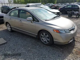 2006 Honda Civic LX z VIN 1HGFA16596L112806, wystawiony jako IAAI lot #41937412 z przebiegiem 165 384 mil mil oraz . Historia ofert i sprzedaży dostępna na DreamBid. Obrazek 1.