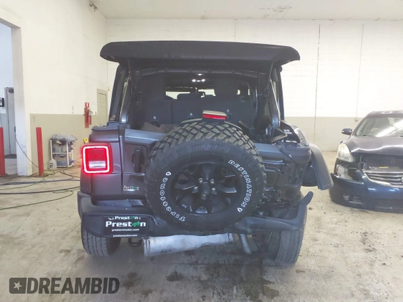 2021 Jeep Wrangler Unlimited Sport S with VIN 1C4HJXDN8MW744768, listed as a IAAI auction lot 41894327 with 47,826 mi miles and . Bid and sale history available at DreamBid. Image 16.