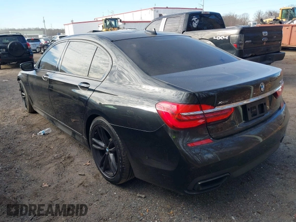 2019 BMW 7 Series 750i xDrive with VIN WBA7F2C52KB240302, listed as a IAAI auction lot 40984933 with 93,737 mi miles and . Bid and sale history available at DreamBid. Image 3.