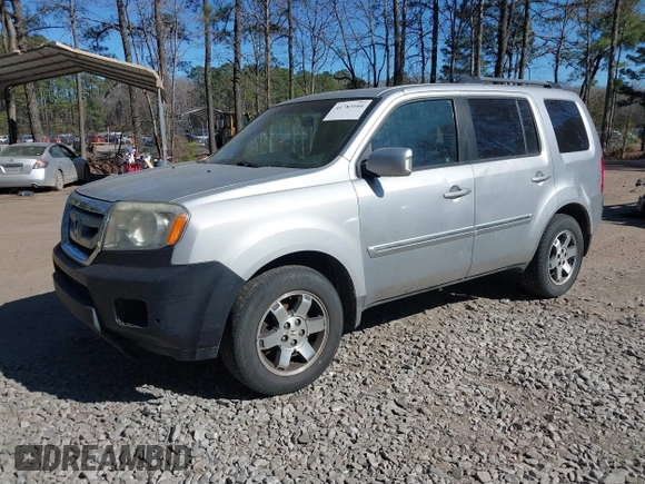 2010 Honda Pilot Touring with VIN 5FNYF4H91AB020868, listed as a IAAI auction lot 41783104 with 298,022 mi miles and . Bid and sale history available at carsss.com. Image 19.