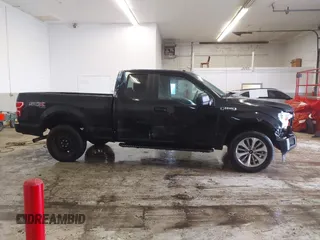 2018 Ford F-150 XL with VIN 1FTEX1EP1JKE74560, listed as a IAAI auction lot 41531539 with 54,558 mi miles and . Bid and sale history available at DreamBid. Image 13.