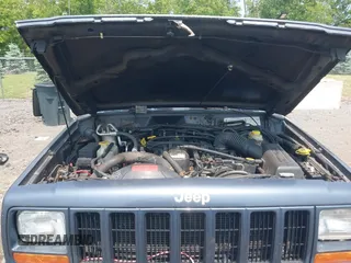 2001 Jeep Cherokee Sport z VIN 1J4FF48S51L531033, wystawiony jako IAAI lot #42423910 z przebiegiem 90 438 mil mil oraz . Historia ofert i sprzedaży dostępna na DreamBid. Obrazek 10.