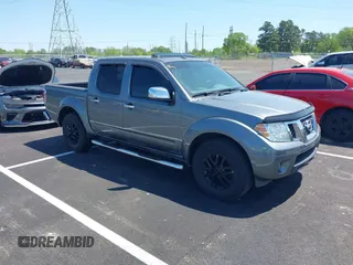 2016 Nissan Frontier SV z VIN 1N6AD0ER9GN731133, wystawiony jako IAAI lot #42045721 z przebiegiem 115 653 mil mil oraz . Historia ofert i sprzedaży dostępna na DreamBid. Obrazek 1.