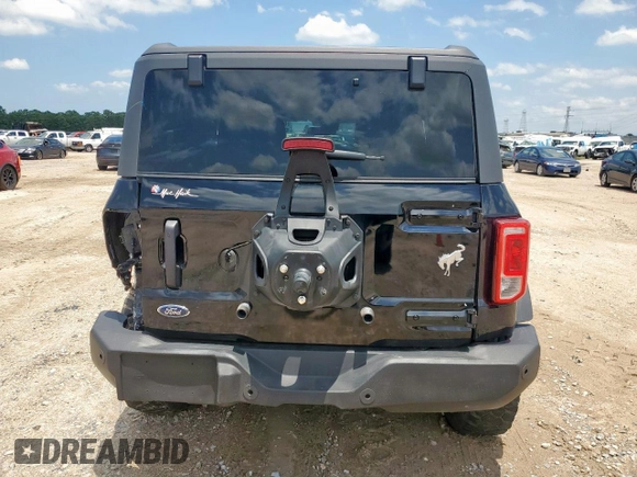 2023 Ford Bronco z VIN 1FMDE5BH0PLB83665, wystawiony jako Copart lot #60420145 z przebiegiem 16 678 mil mil oraz Czysty tytuł • Clean title. Historia ofert i sprzedaży dostępna na DreamBid. Obrazek 6.