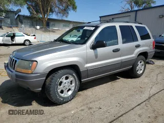 2001 Jeep Grand Cherokee Laredo z VIN 1J4GW48S91C580921, wystawiony jako Copart lot #59005625 z przebiegiem 163 827 mil mil oraz Szkoda całkowita • Salvage title. Historia ofert i sprzedaży dostępna na DreamBid. Obrazek 1.