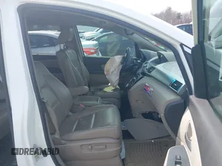 2012 Honda Odyssey EX-L with VIN 5FNRL5H65CB082916, listed as a IAAI auction lot 42052713 with 217,267 mi miles and . Bid and sale history available at carsss.com. Image 5.