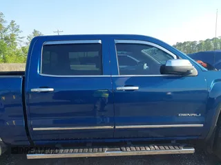 2015 GMC Sierra 1500 Denali z VIN 3GTP1WEC2FG201307, wystawiony jako IAAI lot #41931366 z przebiegiem 99 644 mil mil oraz . Historia ofert i sprzedaży dostępna na DreamBid. Obrazek 12.