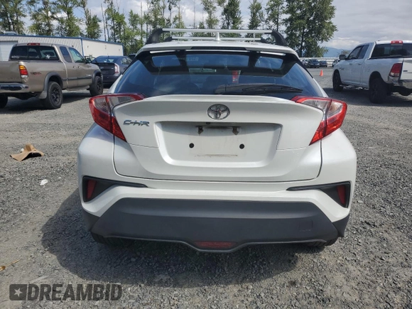 2018 Toyota C-HR XLE with VIN NMTKHMBX9JR060424, listed as a Copart auction lot 57913775 with 104,847 mi miles and Salvage title. Bid and sale history available at DreamBid. Image 6.