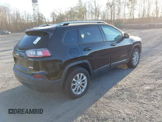 2020 Jeep Cherokee Latitude with VIN 1C4PJMCB7LD625377, listed as a IAAI auction lot 41584829 with 95,895 mi miles. Bid and sale history available at carsss.com. Image 4.
