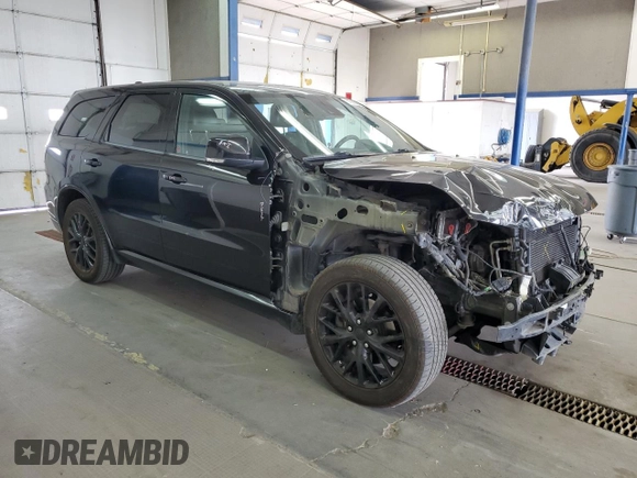 2015 Dodge Durango R/T with VIN 1C4SDJCTXFC817802, listed as a Copart auction lot 61962865 with 146,826 mi miles and Salvage title. Bid and sale history available at DreamBid. Image 4.