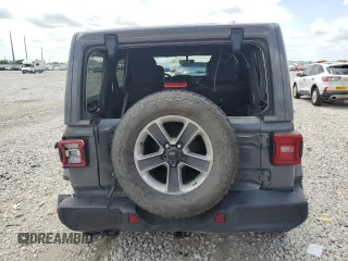 2020 Jeep Wrangler Unlimited Sahara with VIN 1C4HJXEN9LW121382, listed as a Copart auction lot 53279355 with 55,954 mi miles and Salvage title. Bid and sale history available at DreamBid. Image 6.