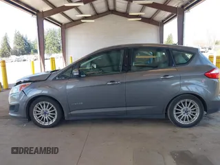 2013 Ford C-Max SE z VIN 1FADP5AU4DL556432, wystawiony jako IAAI lot #41703080 z przebiegiem 147 693 mil mil oraz . Historia ofert i sprzedaży dostępna na DreamBid. Obrazek 14.