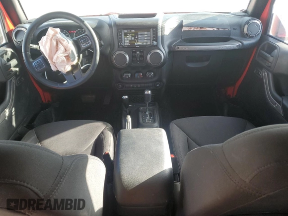 2015 Jeep Wrangler Unlimited Willys Wheeler with VIN 1C4BJWDG8FL574014, listed as a Copart auction lot 51921255 with 54,134 mi miles and Salvage Title. Bid and sale history available at DreamBid. Image 8.