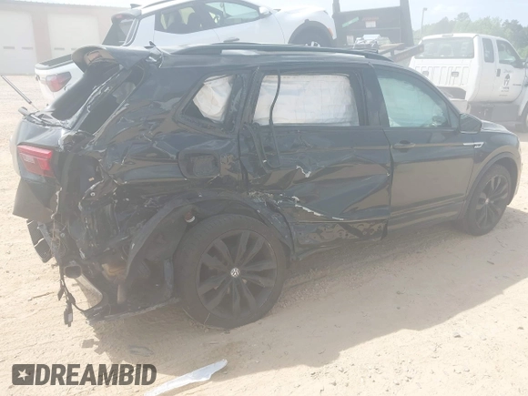 2021 Volkswagen Tiguan SE z VIN 3VV3B7AX5MM027369, wystawiony jako IAAI lot #42082821 z przebiegiem 74 024 mil mil oraz . Historia ofert i sprzedaży dostępna na DreamBid. Obrazek 17.