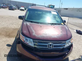 2011 Honda Odyssey EX with VIN 5FNRL5H42BB021438, listed as a IAAI auction lot 41978690 with 190,495 mi miles and . Bid and sale history available at carsss.com. Image 13.
