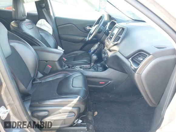 2019 Jeep Cherokee Trailhawk with VIN 1C4PJMBX3KD246100, listed as a IAAI auction lot 41191581 with 98,124 mi miles and . Bid and sale history available at DreamBid. Image 5.