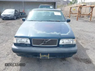 1996 Volvo S70 z VIN YV1LS5548T2285128, wystawiony jako IAAI lot #41754769 z przebiegiem 109 101 mil mil oraz . Historia ofert i sprzedaży dostępna na DreamBid. Obrazek 6.