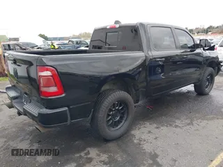 2019 Ram 1500 Big Horn/Lone Star with VIN 1C6SRFFT9KN625013, listed as a IAAI auction lot 41611276 with 100,463 mi miles. Bid and sale history available at carsss.com. Image 4.