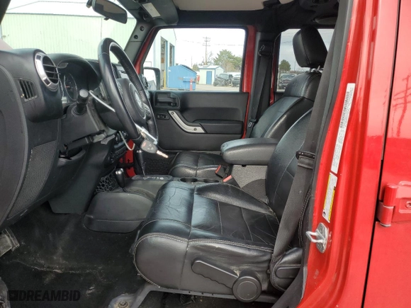 2012 Jeep Wrangler Unlimited Sahara with VIN 1C4BJWEGXCL223261, listed as a Copart auction lot 49350525 with 153,256 mi miles and Salvage Title. Bid and sale history available at carsss.com. Image 7.