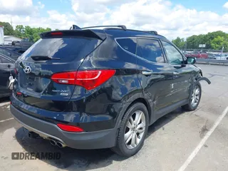 2013 Hyundai Santa Fe Sport z VIN 5XYZUDLA1DG050879, wystawiony jako IAAI lot #42236937 z przebiegiem 124 779 mil mil oraz . Historia ofert i sprzedaży dostępna na DreamBid. Obrazek 4.