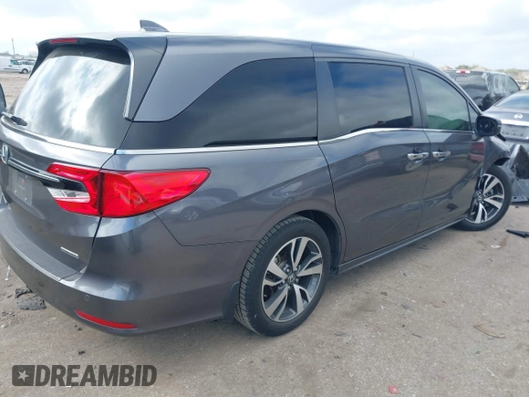2022 Honda Odyssey Touring with VIN 5FNRL6H80NB023623, listed as a IAAI auction lot 41512586 with 63,329 mi miles and . Bid and sale history available at DreamBid. Image 4.