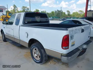 1999 Ford F-150 Work Series with VIN 1FTRX17W5XNB33627, listed as a IAAI auction lot 41933365 with 207,118 mi miles. Bid and sale history available at carsss.com. Image 3.