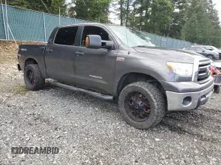2012 Toyota Tundra 4WD Truck with VIN 5TFDY5F13CX263098, listed as a Copart auction lot 53458655 with 203,332 mi miles and Salvage Title. Bid and sale history available at carsss.com. Image 4.