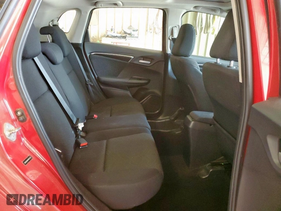 2015 Honda Fit EX-L z VIN 3HGGK5H88FM701702, wystawiony jako Copart lot #56390935 z przebiegiem 111 410 mil mil oraz Szkoda całkowita • Salvage title. Historia ofert i sprzedaży dostępna na DreamBid. Obrazek 10.