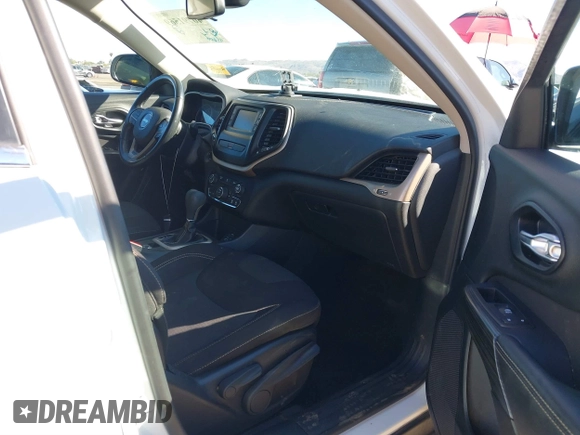 2016 Jeep Cherokee Altitude with VIN 1C4PJLCB6GW200348, listed as a IAAI auction lot 40791569 with 95,600 mi miles. Bid and sale history available at carsss.com. Image 5.