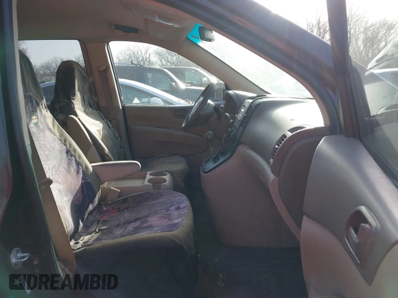 2011 Kia Sedona LX with VIN KNDMG4C70B6411556, listed as a IAAI auction lot 41768777 with 124,180 mi miles. Bid and sale history available at carsss.com. Image 5.