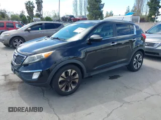 2011 Kia Sportage SX with VIN KNDPC3A69B7149771, listed as a IAAI auction lot 42012102 with 125,157 mi miles and . Bid and sale history available at carsss.com. Image 2.