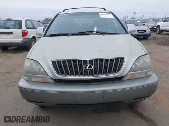 1999 Lexus RX 300 Luxury SUV with VIN JT6HF10U5X0017629, listed as a IAAI auction lot 41569806 with 174,068 mi miles. Bid and sale history available at carsss.com. Image 6.