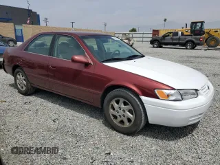 1999 Toyota Camry LE z VIN JT2BF22K8X0181675, wystawiony jako Copart lot #55057875 z przebiegiem 184 657 mil mil oraz Szkoda całkowita • Salvage title. Historia ofert i sprzedaży dostępna na DreamBid. Obrazek 4.