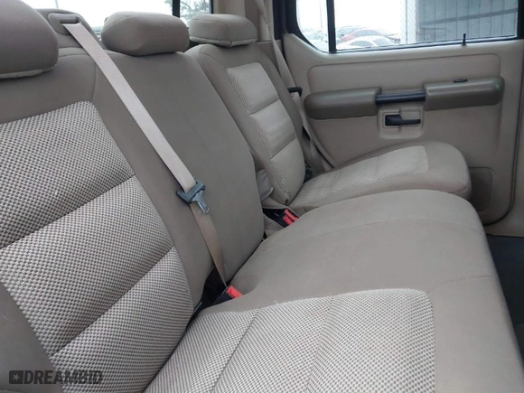 2005 Ford Explorer Sport Trac XLS with VIN 1FMZU67K25UB80616, listed as a IAAI auction lot 41505344 with 160,667 mi miles. Bid and sale history available at carsss.com. Image 8.