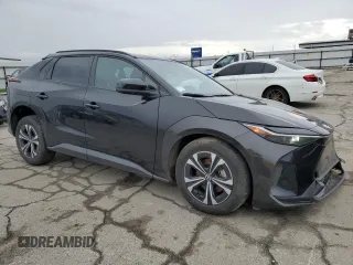 2023 Toyota bZ4X XLE with VIN JTMAAAAA7PA026565, listed as a Copart auction lot 44825145 with 17,890 mi miles and Salvage Title. Bid and sale history available at DreamBid. Image 4.