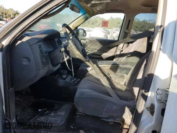 2001 Dodge Dakota z VIN 1B7HL2AX41S256519, wystawiony jako Copart lot #81951634 z przebiegiem Nie podano mil oraz Nie do naprawy • Non repairable. Historia ofert i sprzedaży dostępna na DreamBid. Obrazek 7.
