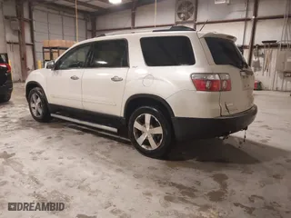 2011 GMC Acadia SLT1 with VIN 1GKKRRED7BJ265501, listed as a IAAI auction lot 41561336 with 152,916 mi miles. Bid and sale history available at carsss.com. Image 3.
