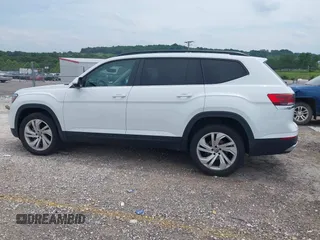 2021 Volkswagen Atlas SE with VIN 1V2HR2CA7MC556625, listed as a IAAI auction lot 42401730 with 75,261 mi miles and . Bid and sale history available at DreamBid. Image 14.